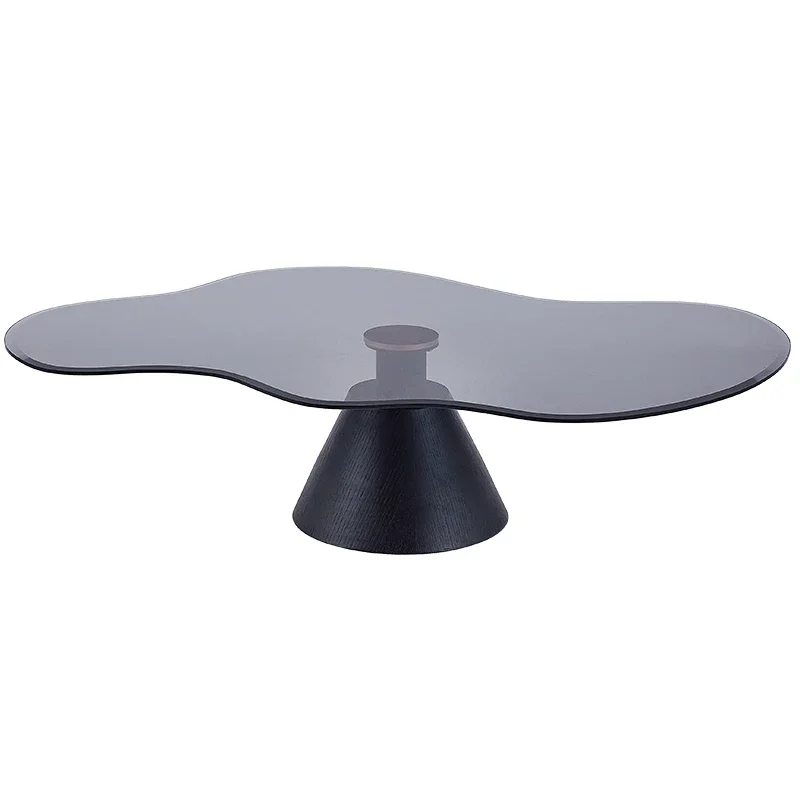 Modern Tempered Glass Top Coffee Table with sculptural black pedestal base and organic-shaped glass surface for contemporary interiors.