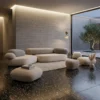 11-25096 Minimalist living room with a low, cream modular sofa, round ottomans, and a textured rug beside a large glass wall.