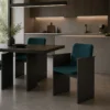Modern dining area in a kitchen: dark rectangular table with teal upholstered chairs and a potted plant on the table