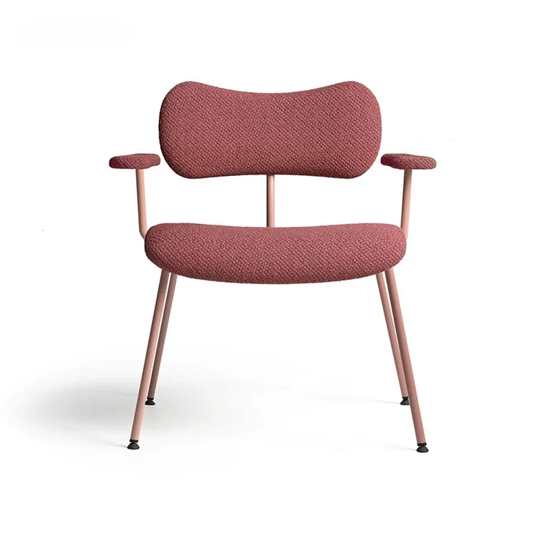NOD Lounge Chair Upholstered Fabric featuring textured pink upholstery, curved cushioned backrest, slim metal legs, and modern minimalist design