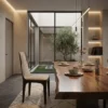 Contemporary dining room with a live-edge wooden table, beige upholstered chair, and a glass wall overlooking an indoor courtyard with a tree.