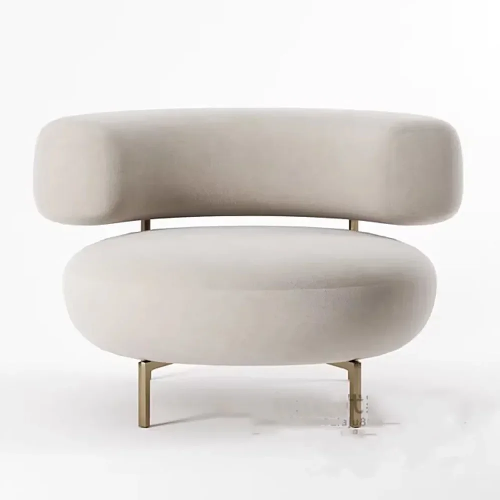 Chair Thompson Sculptural Shape featuring a curved, minimalist upholstered seat with soft contours and sleek metal legs, adding a modern artistic touch to contemporary interiors