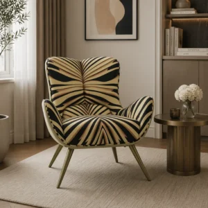 Armchair with bold black-and-tan geometric pattern in a calm living room, beside a round brass table and neutral décor.