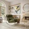 Cozy living room with a green recliner, plaid throw, and light wood furniture near a fireplace and large arched window.