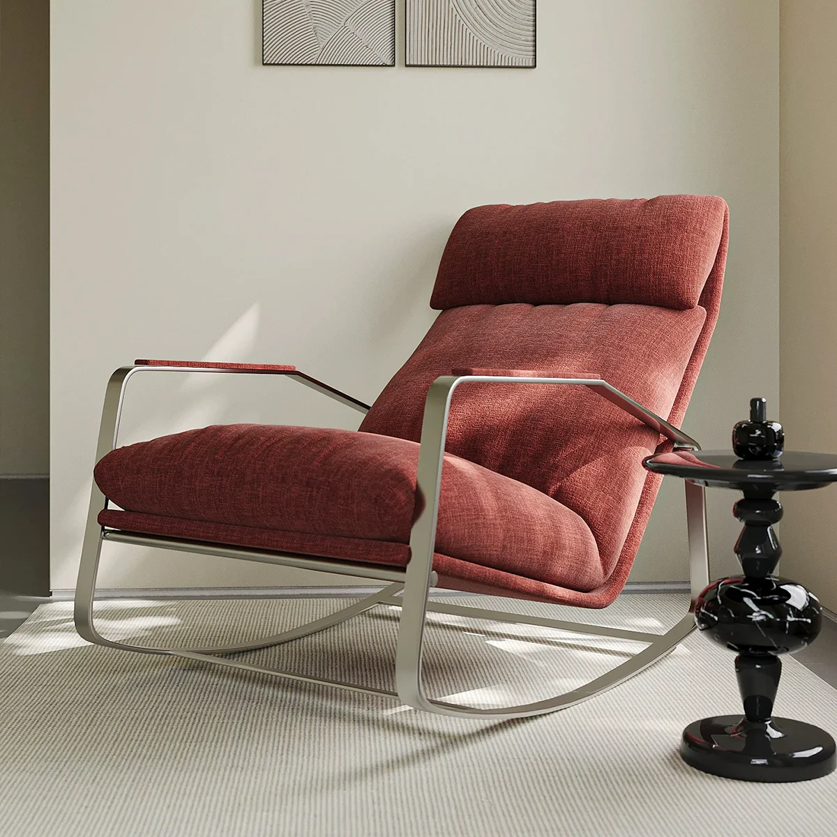 Contemporary red upholstered lounge chair with a metal frame, paired with a black glass-topped side table in a minimalist living room setting.