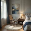 Bedroom corner with a cane rocking chair, round white rug, nightstand and lamp beside a tufted bed; abstract blue and gold wall art.